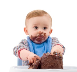 baby eating cake 