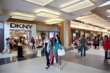 Two designer brands are scheduled to debut first-in-market outlet locations at Sawgrass Mills during March 2015