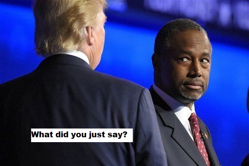 Carson watches trump