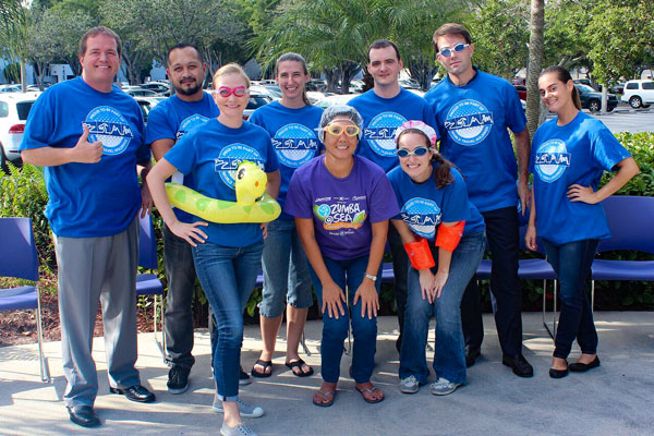 Pie in the face participants. Back row: Drew Daly, Victor Choy, Ashlee Campbell, John Sheets, Sean Tolkin and Cristina Monge. Front row: Rosemarie Reed, Gina Spencer and Rachel Shapiro 