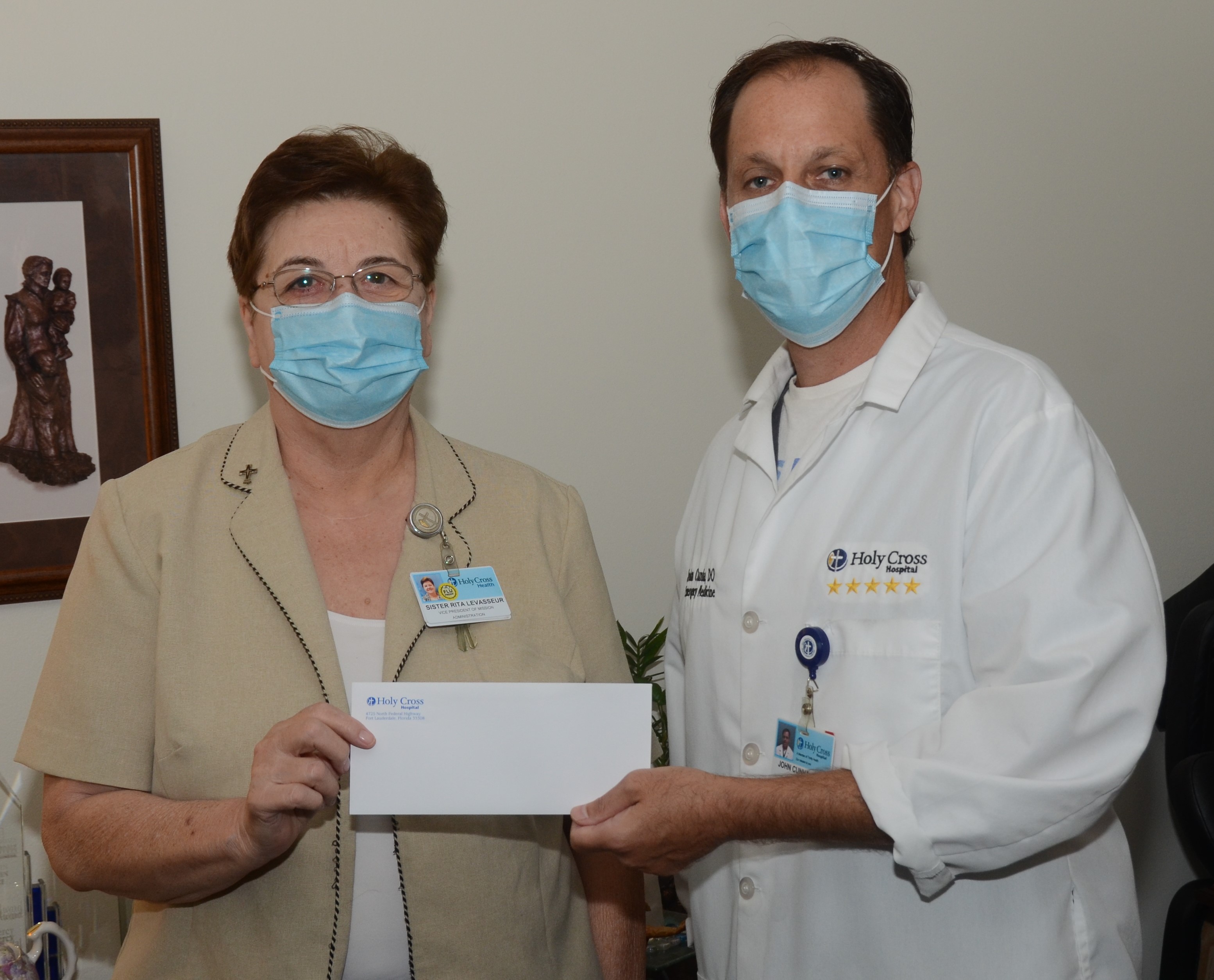 Sister Rita J. Levasseur, VP of Mission Integration for Holy Cross Health, and John Cunha, D.O., Emergency Medicine at Holy Cross