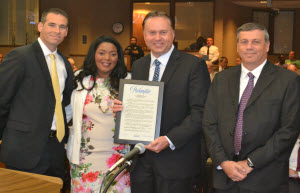 Mayor Barbara Sharief presents proclamation to AeroTurbine CEO Michael King. Left to right Gary Fuller COO Mayor Sharief Michael King David Crull CFO