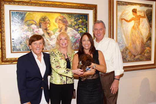 Drew and Sandy Romanovitz with Lisa Burgess and her dog Mulligan with Gerry Weber, Board President for the Humane Society of Broward County 