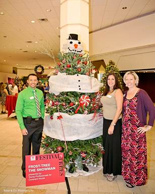 Matthew Brennan, Judith Rivera and Michelle Zimmer from Covenant House with Frost-Tree the Snowman, winner of the $1,000 donation. 