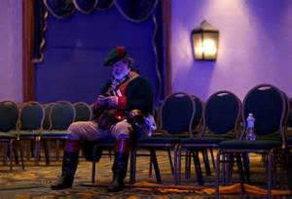 A lone lacky waits for instructions