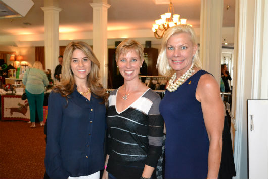 PAWS VP of Ways & Means Dawn Dellapina, PAWS President Ingrid Poulin, and event Chairperson Stacy Sager