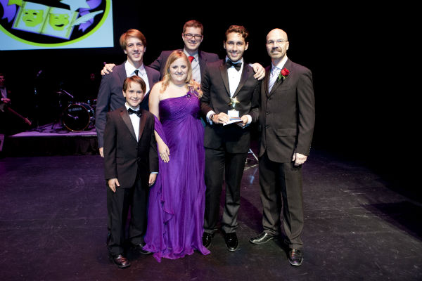 Presenter Daniel Bonnett with representatives for the Winner of Best Son