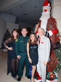 A panel of esteemed judges, including Stacy Ostrau, publisher of Society Scene, Sheriff Scott Israel of the Broward Sheriff’s Office, Kelly Blanco, traffic reporter at WTVJ (NBC6) and Mark Corbett, associate publisher at Gold Coast Magazine, selected “O Claus-enbaum” presented by Young Professionals for Covenant House as one of the winning trees