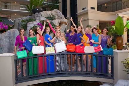 Brenda Clermont (center) was the luncheon&rsquo;s grand prize winner, receiving a Tory Burch handbag and luxurious shopping excursion for herself and ten friends courtesy of The Colonnade Outlets at Sawgrass Mills